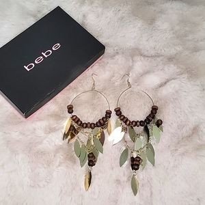Bebe wood & disc long earring